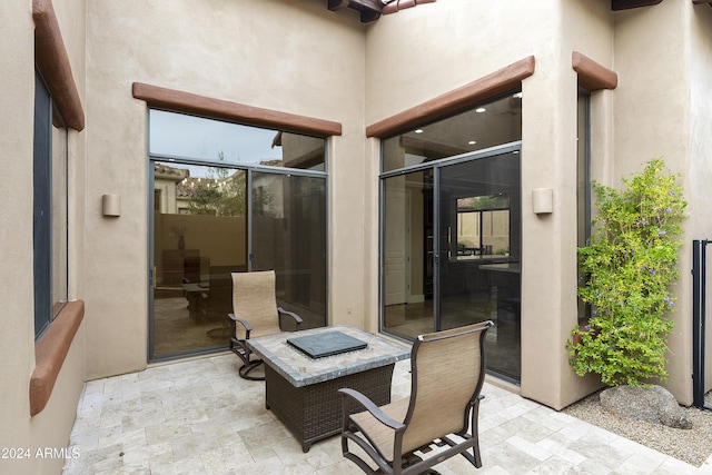 view of patio featuring a fire pit