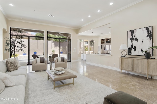 living room with visible vents, recessed lighting, and a wealth of natural light