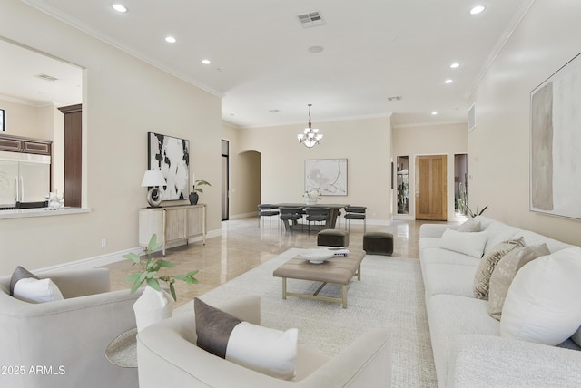 living room with arched walkways, recessed lighting, and visible vents