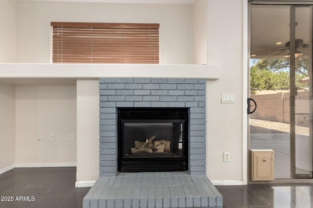 interior details featuring a brick fireplace