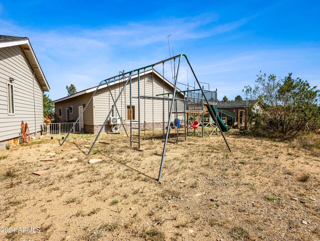 view of outdoor structure featuring a playground