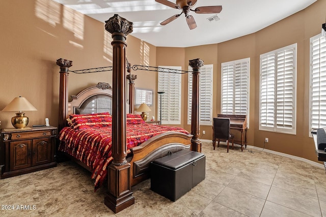 tiled bedroom with ceiling fan