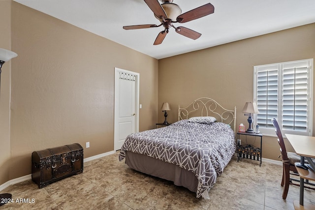 bedroom featuring ceiling fan