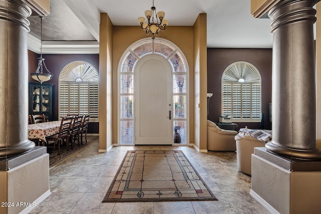 entrance foyer with a chandelier