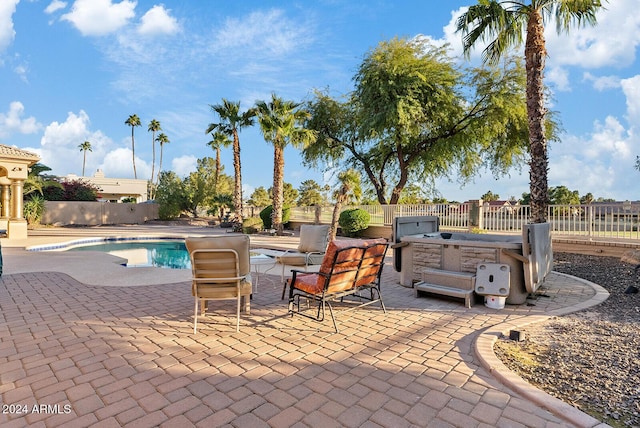 view of patio featuring a fenced in pool