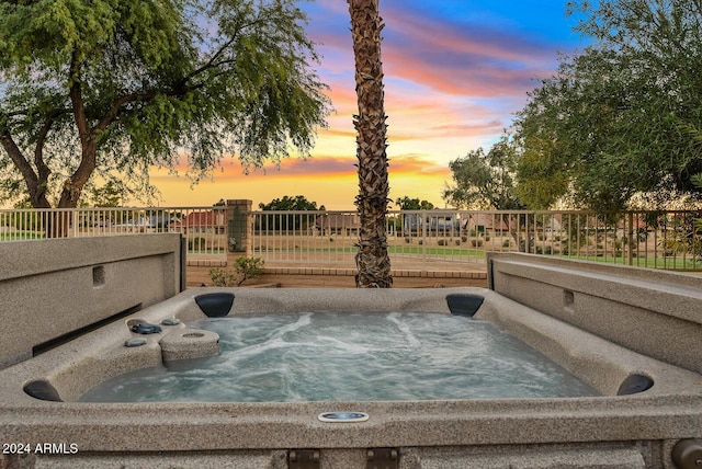 exterior space with a hot tub