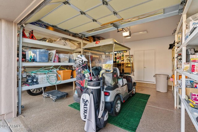 garage featuring a garage door opener