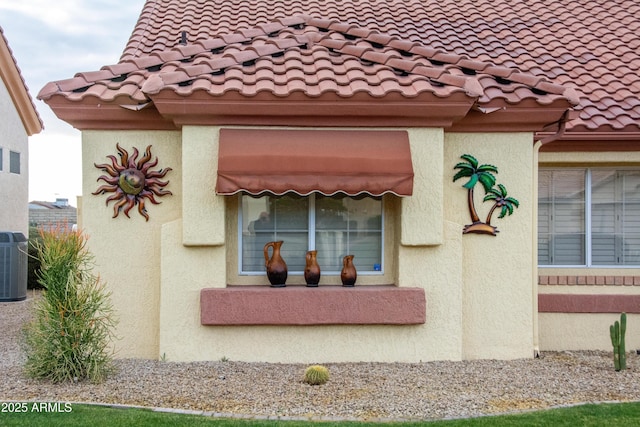 view of home's exterior with central air condition unit