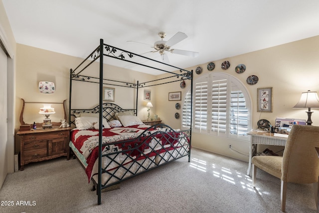 bedroom with carpet floors, a closet, and ceiling fan