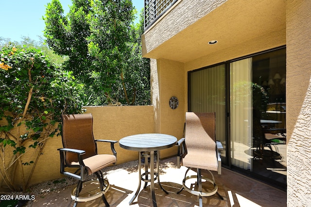 view of patio with a balcony