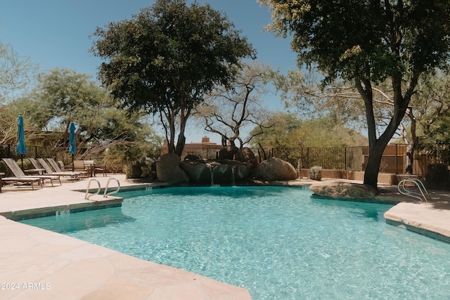 view of swimming pool featuring a patio