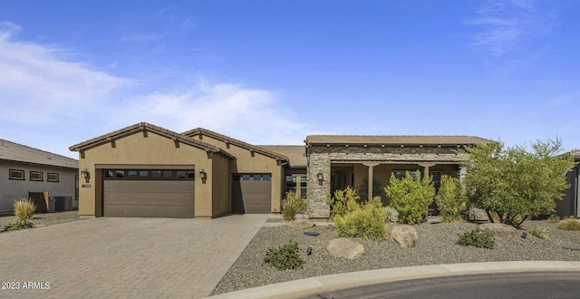 view of front of property with a garage