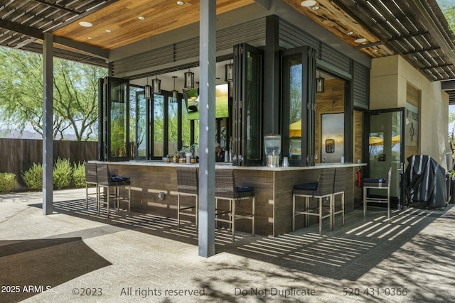 view of patio / terrace with a bar