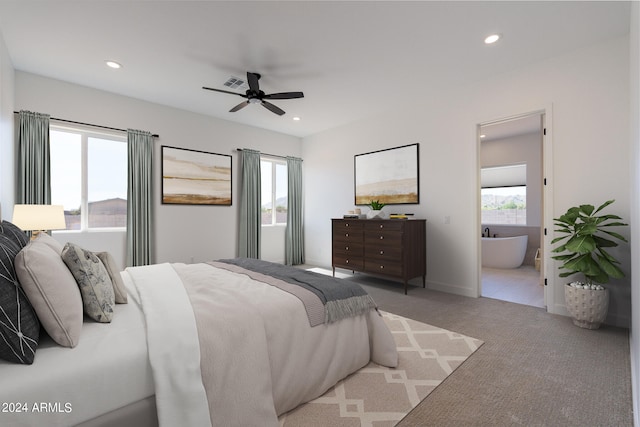 bedroom featuring ensuite bath, ceiling fan, and carpet floors