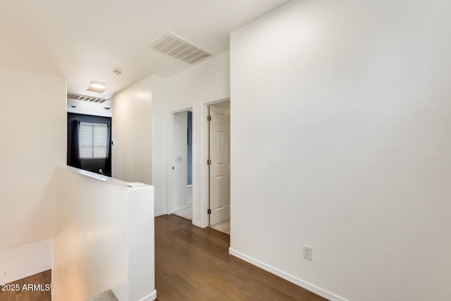 hallway featuring dark hardwood / wood-style floors