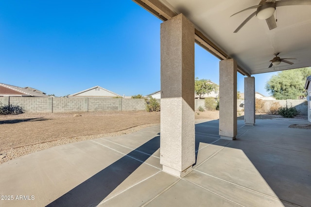 view of patio featuring ceiling fan