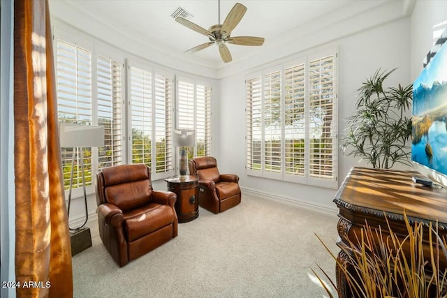 sitting room featuring carpet flooring and ceiling fan