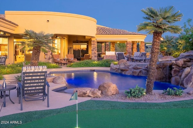 view of swimming pool with a patio