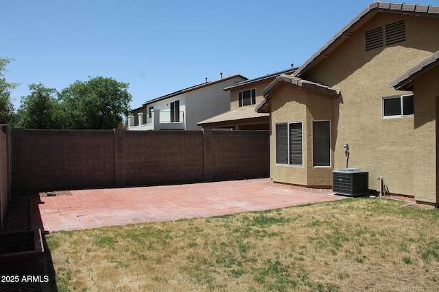 3559 N 143rd Ave, Goodyear, AZ 85395 - rear view of house featuring stucco siding, a patio area, and central AC