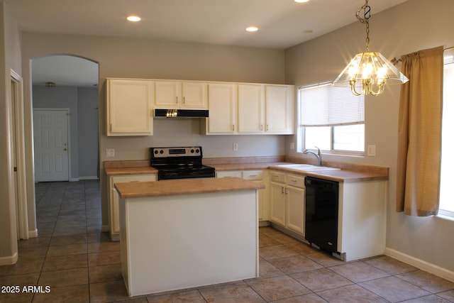 3559 N 143rd Ave, Goodyear, AZ 85395 - kitchen with stainless steel electric range, black dishwasher, arched walkways, under cabinet range hood, and a sink
