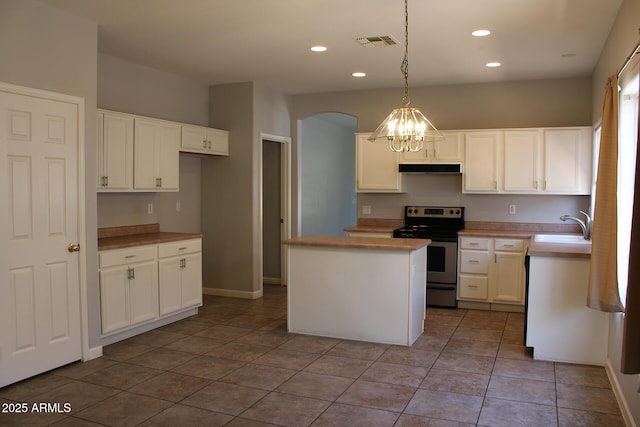 3559 N 143rd Ave, Goodyear, AZ 85395 - kitchen with electric stove, a chandelier, a sink, tile patterned flooring, and recessed lighting