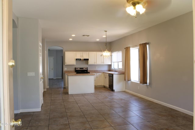 3559 N 143rd Ave, Goodyear, AZ 85395 - kitchen with stainless steel range with electric stovetop, a sink, arched walkways, black dishwasher, and white cabinets