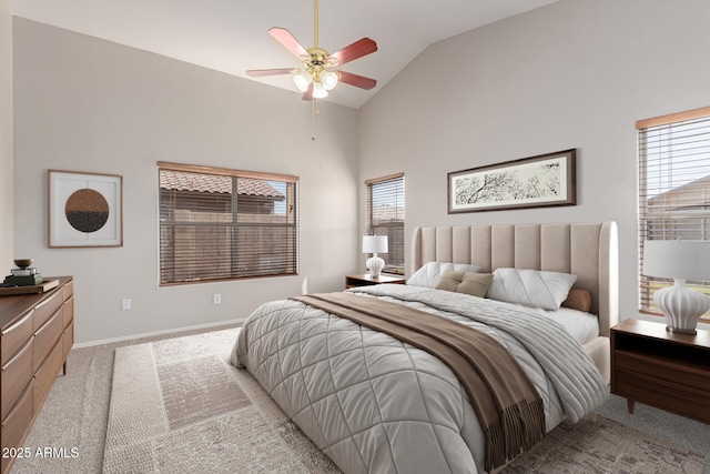 bedroom with high vaulted ceiling, baseboards, a ceiling fan, and carpet flooring