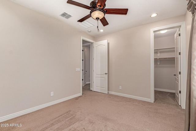 4724 S Anitole Way, Mesa, AZ 85212 - unfurnished bedroom featuring light carpet, a walk in closet, recessed lighting, ceiling fan, and a closet