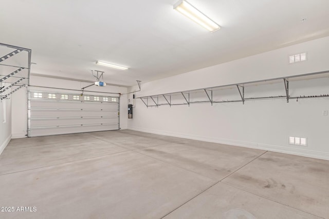 4724 S Anitole Way, Mesa, AZ 85212 - garage featuring baseboards and a garage door opener