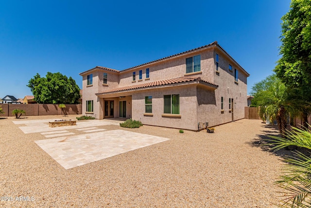 4724 S Anitole Way, Mesa, AZ 85212 - back of property featuring stucco siding, a fenced backyard, a patio area, and a tiled roof
