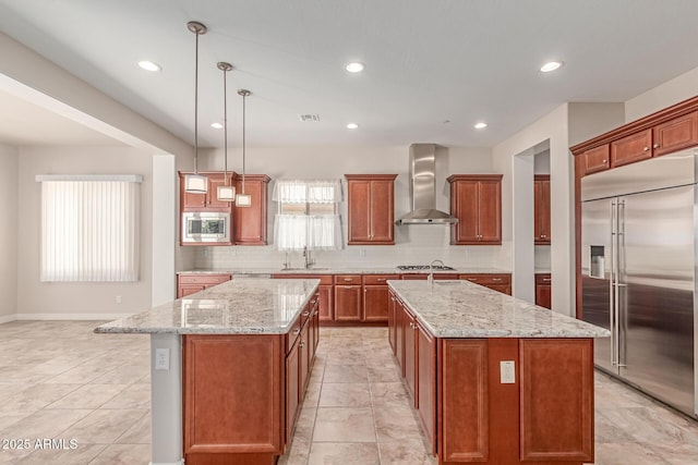 4724 S Anitole Way, Mesa, AZ 85212 - kitchen featuring built in appliances, wall chimney exhaust hood, a center island with sink, decorative backsplash, and recessed lighting