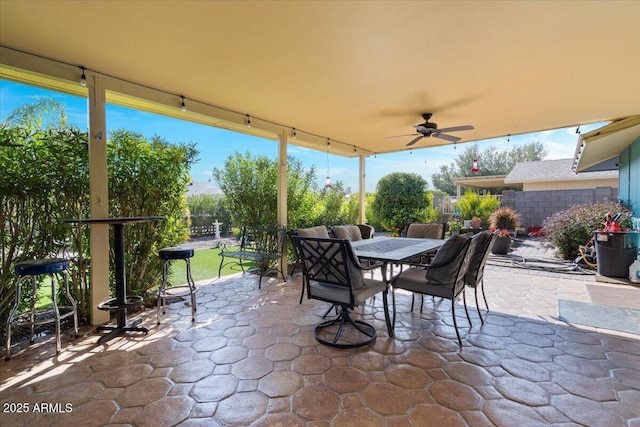 view of patio featuring ceiling fan