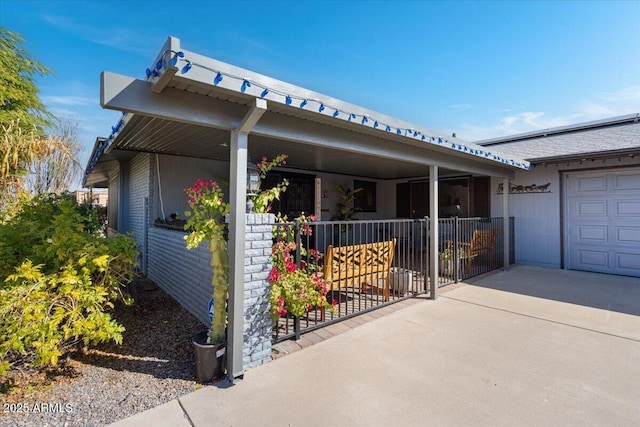 view of side of property with a garage