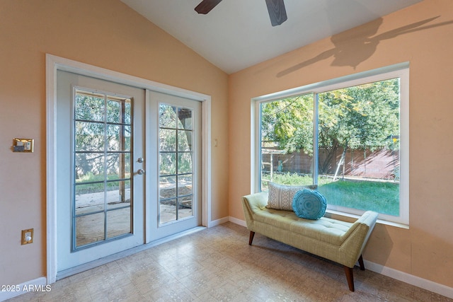 entryway with french doors, ceiling fan, and vaulted ceiling