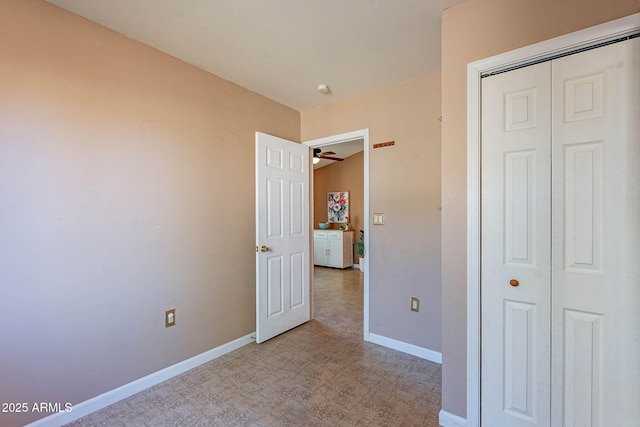 unfurnished bedroom with a closet