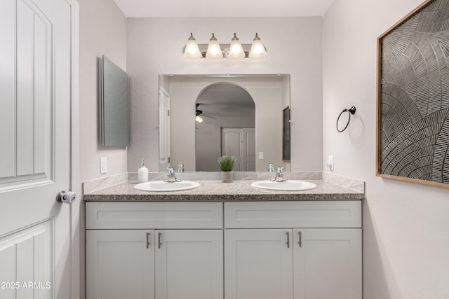 20750 E Chase Ct, Florence, AZ 85132 - full bathroom with double vanity and a ceiling fan