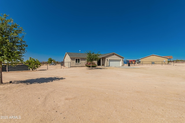 20750 E Chase Ct, Florence, AZ 85132 - view of front facade featuring a garage