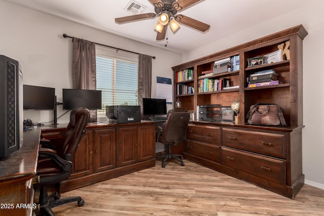 20750 E Chase Ct, Florence, AZ 85132 - home office with a ceiling fan and light wood-style floors