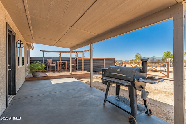 20750 E Chase Ct, Florence, AZ 85132 - fenced backyard with a patio area and a grill