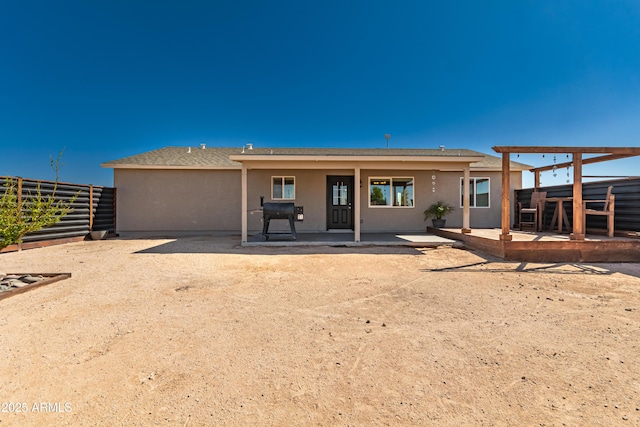20750 E Chase Ct, Florence, AZ 85132 - rear view of house featuring a patio and stucco siding