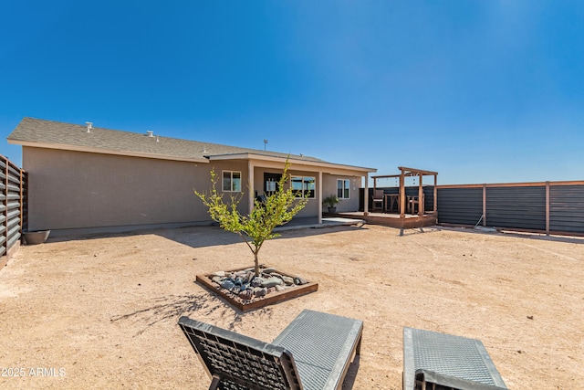 20750 E Chase Ct, Florence, AZ 85132 - back of property with stucco siding and a patio