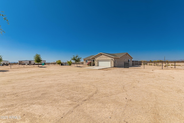 20750 E Chase Ct, Florence, AZ 85132 - view of yard featuring a garage