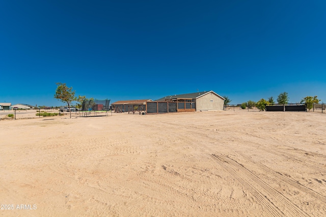 20750 E Chase Ct, Florence, AZ 85132 - view of yard featuring an outbuilding and an exterior structure
