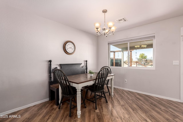20750 E Chase Ct, Florence, AZ 85132 - dining room featuring a chandelier and wood finished floors