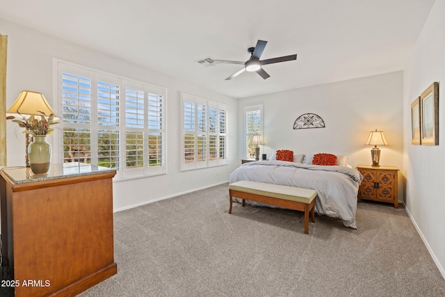 carpeted bedroom featuring ceiling fan