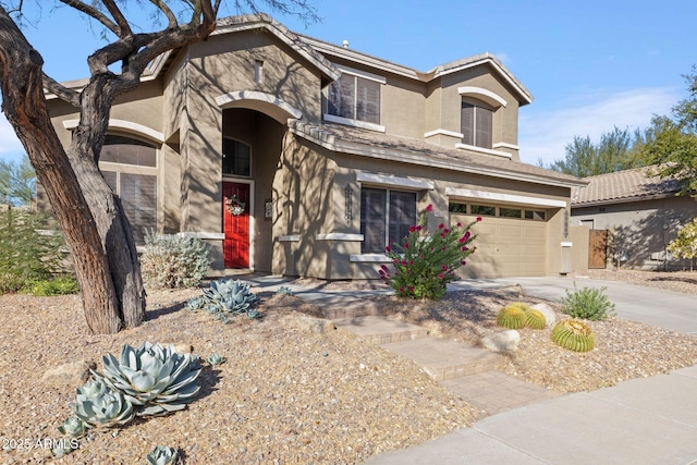 view of front of property featuring a garage