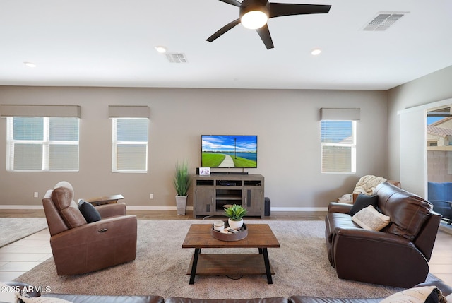 living room with ceiling fan