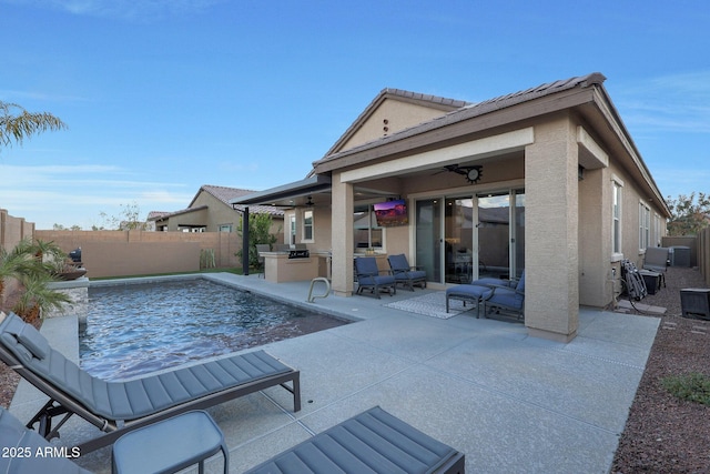 view of pool featuring ceiling fan, area for grilling, and a patio