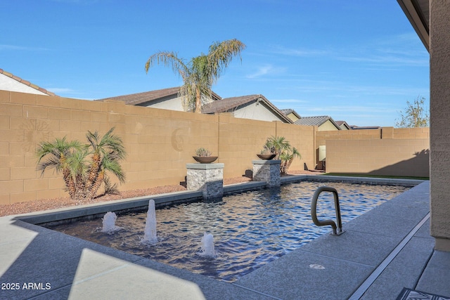 view of pool with pool water feature