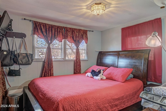 bedroom featuring a textured ceiling